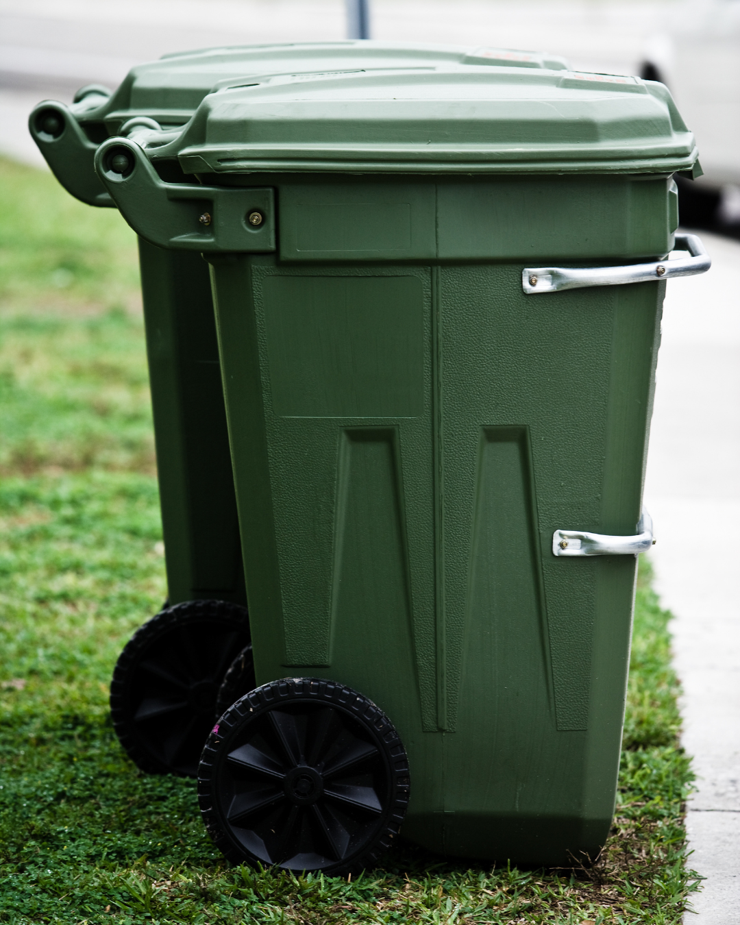 Sparkling clean residential recycling cart after service